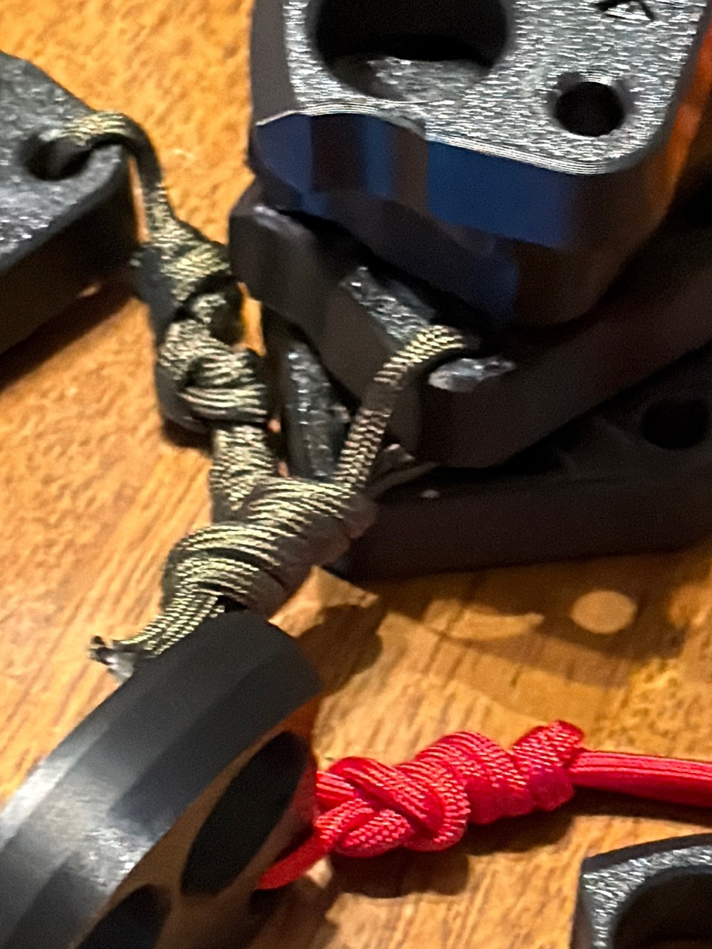 (1) Double Finger Knuckle with green paracord.
